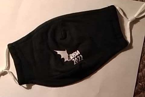 black face mask with Arisia 2022 logo